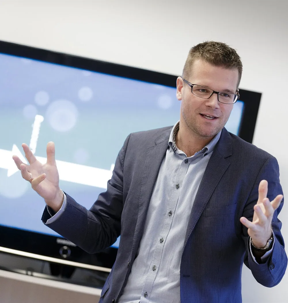 A Napica facilitator teaching a group of leaders